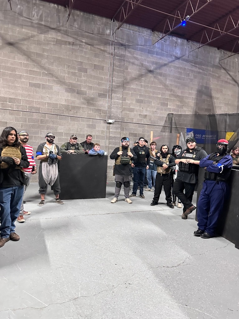 Players lined up on both sides of the arena at Alamogordo Tactical Range
