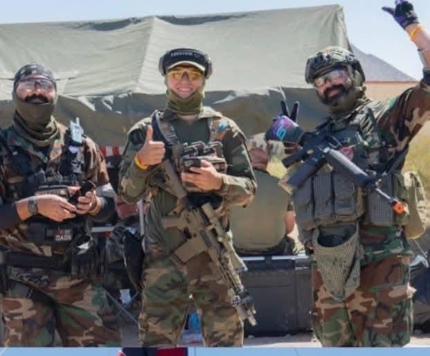 Three players in camo gear giving thumbs up at American Milsim Copperhead XI