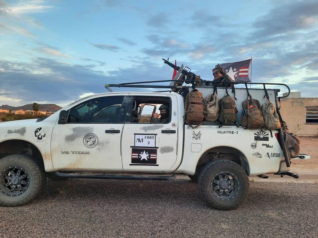 Tactical truck loaded with gear and players at American Milsim Copperhead XI
