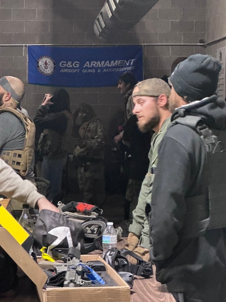 Players gearing up at a G&G Armament airsoft event at Alamogordo Tactical Range