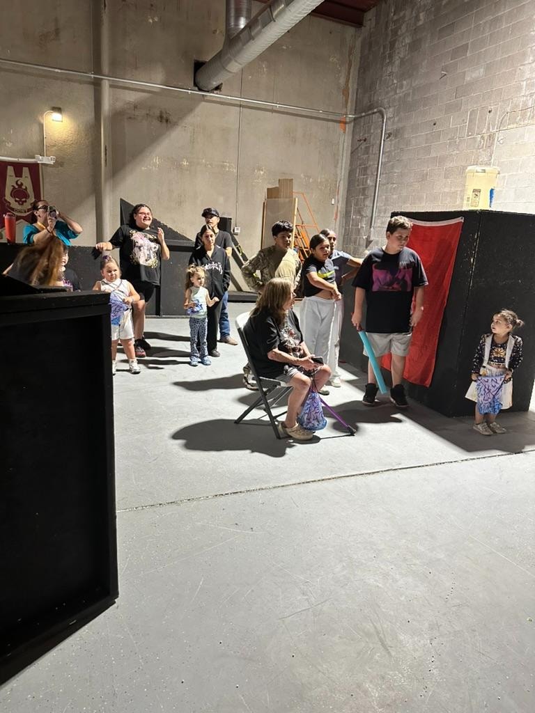 Birthday party group photo at Malia's Nerf battle celebration at ATR